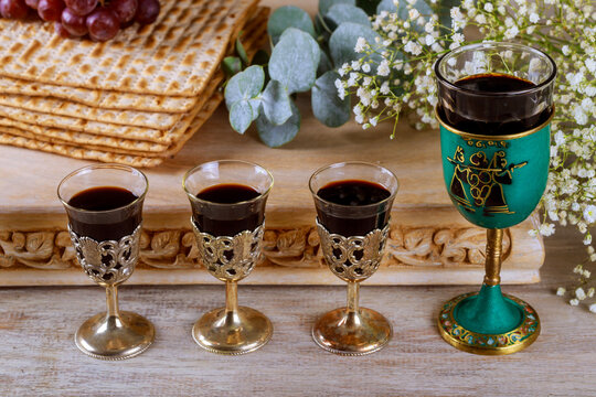 Matzoh passover holiday jewish celebration matzoh with on kiddush four cup of red kosher wine