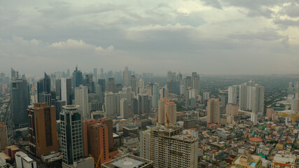 Skyscrapers and business centers in a big city Manila top view. Modern metropolis in Asia, top view.