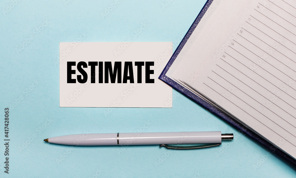 Poster on a light blue background, an open notebook, a white pen and a card with the text estimate. view fr