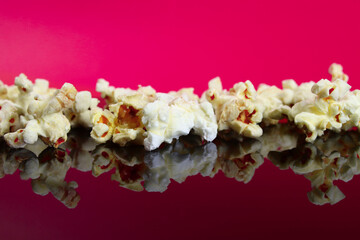 caramel popcorn on a mirror surface