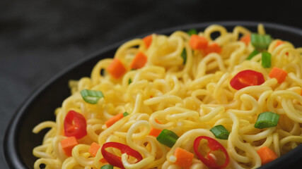 Instant noodles, served with vegetables and herbs