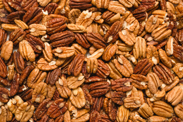 Tasty pecan-nut background. Top view.