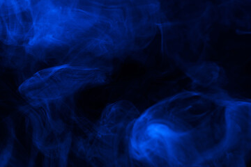 Blue steam on a black background.