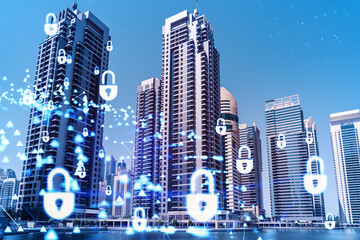 Skyscrapers of Dubai business downtown. International hub of trading and financial services. Lock...