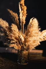 Warm dried flowers on the dining table