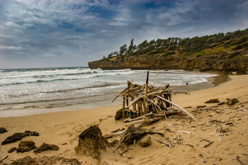 A shelter built by beach hikers on the south shore of Kauai just east of Poipu, Hawaii