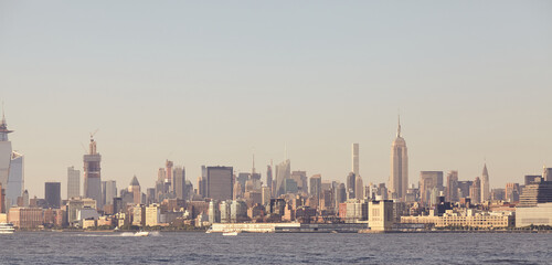 Manhattan panorama at sunset, color toned picture, New York City, US.