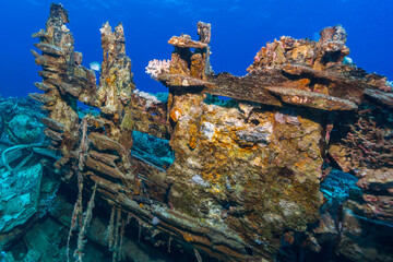 Sunken ship wreck rusted in sea