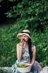 Girl on a picnic in the park.