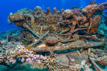 Sunken ship wreck engine rusted in sea