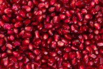 Background of many fresh pomegranate seeds.
Natural background.
