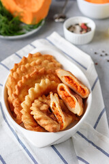 chebureks from a lavash with pumpkin. style rustic. selective focus