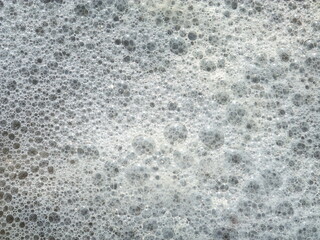 Foam made by the wave on the beach