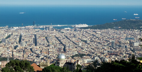 A bird's-eye view of Barcelona, Spain and sea.