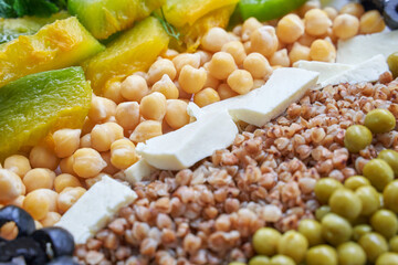 Food bowl with chickpeaks. Health dinner. Vegetarian cooking cuisine. Cafe organic meal. Fresh lunch with pumpkin and feta cheese. Detox spicy. Above view. Flatlay. Closeup