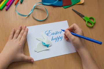 Easter rabbit. greeting card. DIY holiday handicraft decorations. Concept: children's crafts for...