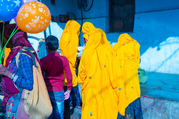 Pushkar / India 27 October 2017 Hindu Women wearing traditional sacred colour rajasthani dresses ...
