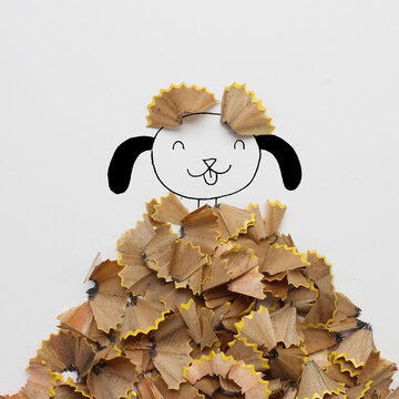 Conceptual dog in a  pile of autumn leaves