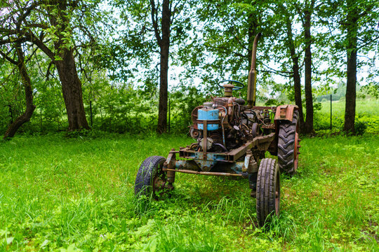old broken tractor in the field