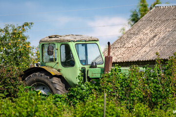 old broken tractor in the field