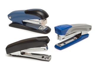 Top view of three staplers isolated on a white background.