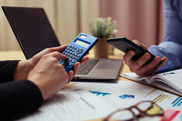 Closeup of businesswoman hands, working in office room