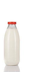 Bottle of milk on white background