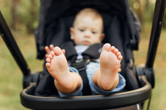 close-up of tiny baby feet happy family concept. Beautiful conceptual image caucasian kid