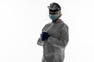 Healthcare worker, medic or paramedic in protective overall gear isolated on white background