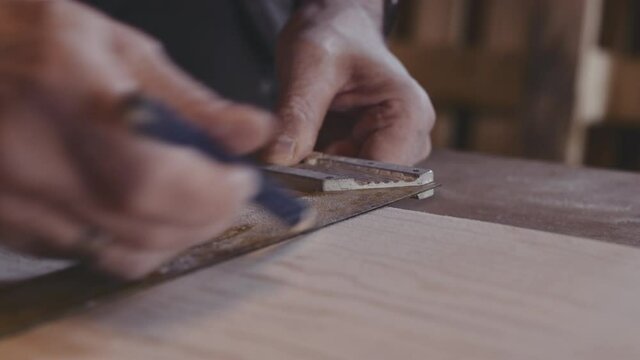 Carpenter T-Square And Pencil In Shop