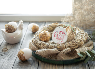 Easter composition with festive eggs in a decorative nest.