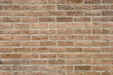brown decorative brick wall with aged texture isolated closeup, old brickwork pattern, abstract...