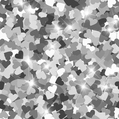 Glitter seamless texture. Actual silver particles. Endless pattern made of sparkling hearts. Unusual