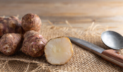 Trendy Winter vegetable. Jerusalem artichoke one of the forgotten vegetables who has become trendy again, on a white background.