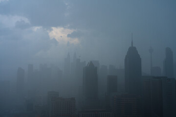 Fototapeta na wymiar Heavy fog landscape of Kuala Lumpur city center