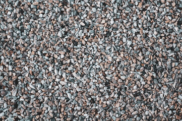 Texture of small granite stones, marble chips for landscape design, beautiful background