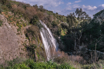 Obraz premium HaEshed waterfall in Nahal [stream] Ayun Nature Reserve, by the town of Metula, Upper Galilee, Israel.