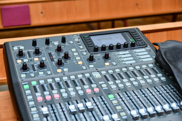 Musical mixing console before working in a recording studio.