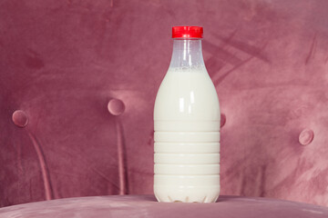 Plastic bottle with milk, one litre volume
