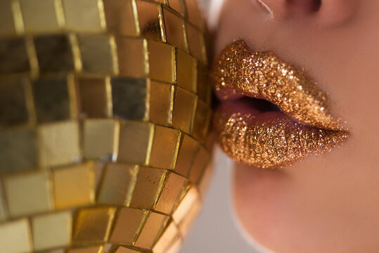 Golden metalic lips makeup. Beautiful lip make up. Sexy bright lipgloss. - Powered by Adobe