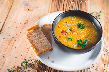 Delicious vegetable potato soup served in a bowl