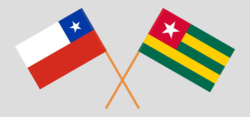 Crossed flags of Chile and Togo. Official colors. Correct proportion
