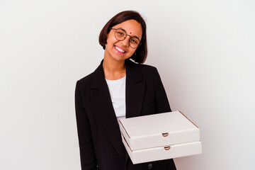 Young business indian woman holding pizzas isolated happy, smiling and cheerful.