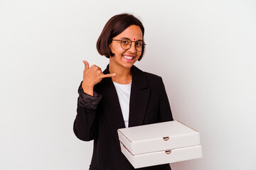 Young business indian woman holding pizzas isolated showing a mobile phone call gesture with fingers.