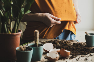 Girl hand showing dirty stain on cloth for cleaning and washing. dirt stains in daily life concept