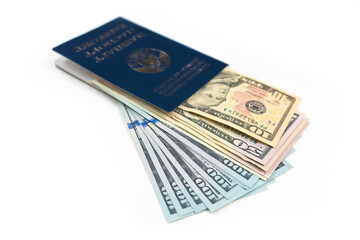 Belorussian passport with european banknotes money isolated on white. Selective focus. Travel and emigration concept.