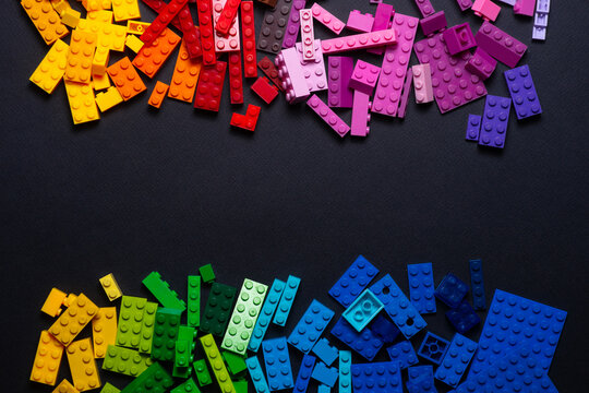 children's construction set, plastic blocks of the construction set are connected in the order of the colors in the rainbow