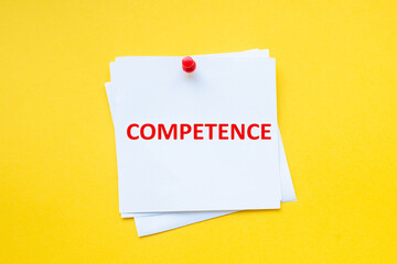 Text competence is king bonds on white sticker with yellow background