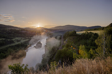 Sunrise over the river Berounka. Photographed from the viewpoint on the ruins of Tetín Castle.