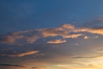 Naklejka na ściany i meble Beautiful sunset sky with amazing colorful clouds